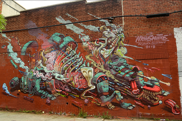 his insanely detailed painting of some sort of dissected cyborg animal was the result of Nychos and Smithe collaborating in Bushwick, Brooklyn. It was the first time these two had worked together and saying their styles compliment each other is surely an understatement. 
